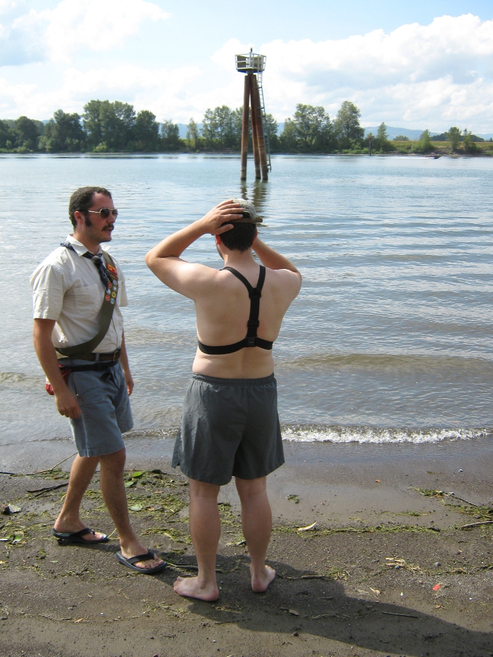 Groom Preparing to Swim to Get His Sash